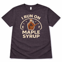 Dark gray t-shirt with 'I Run on Maple Syrup' graphic design on a white background